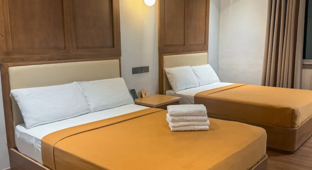 Четырёхместный семейный номер Standard Metro Pines Inn