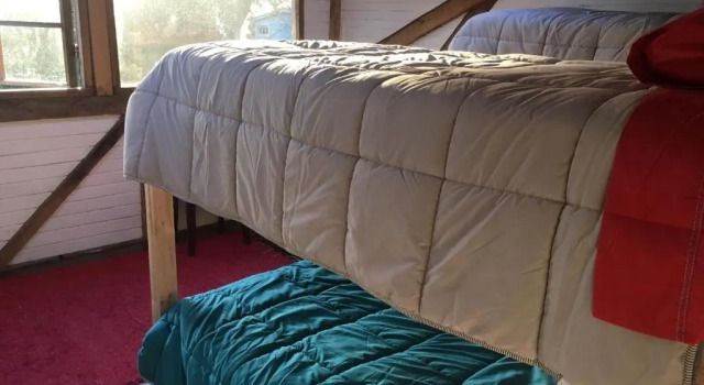 Кровать в общем номере Hostal Climb House