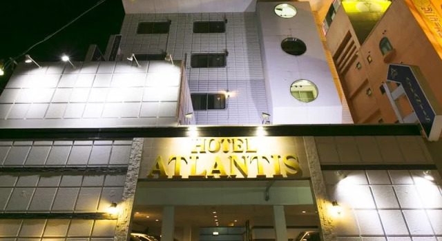 Кровать в общем номере Hotel Atlantis Higashi Osaka