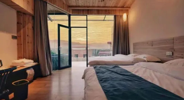 Кровать в общем номере Fogang Tangtang warm house hot spring home stay
