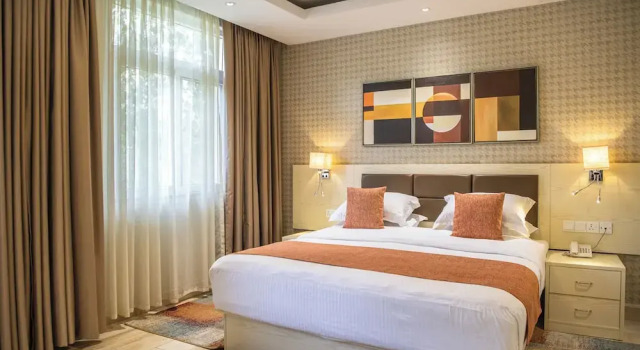 Executive Suite 1 Schlafzimmer mit Balkon und mit Blick auf den Park Park View Courts