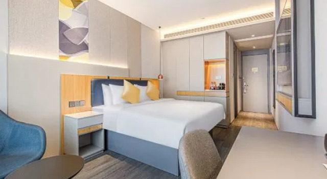 Кровать в общем номере Homeinn Selected Hotel (Jinan 960 Hospital Jinniu Building Materials and Home Expo Center)