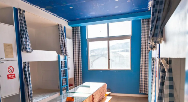 Кровать в общем номере ShangriLa Free Life Youth Hostel