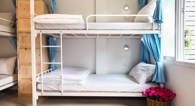 Кровать в общем номере Coop Hostel