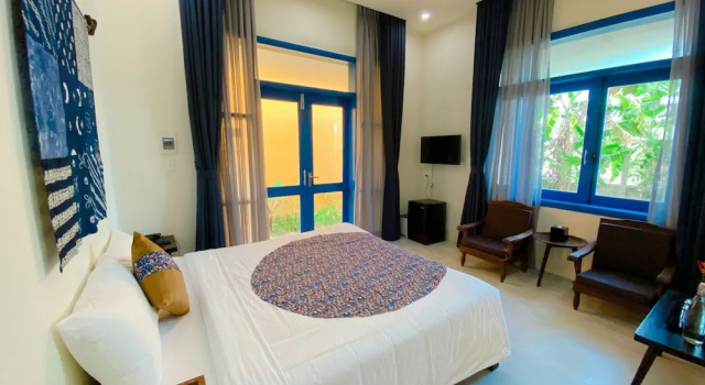 Двухместный семейный номер Standard с балконом и с видом на бассейн Sunkised Paddy Hoi An Villa