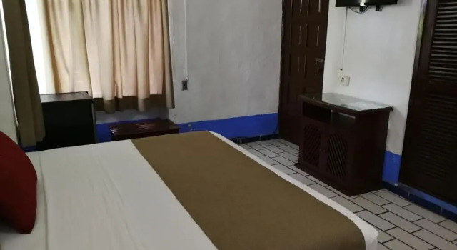 Четырёхместный номер Standard с красивым видом из окна Hotel Hacienda de Melaque