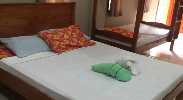 Кровать в общем номере Ds Oceanview Beach Resort