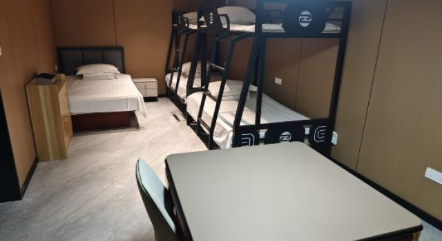 Кровать в общем номере Gushi Tianzi E-sports Hotel