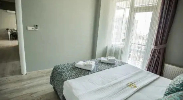 Одноместный семейный люкс с 3 комнатами Отель Doa Suite Hotel