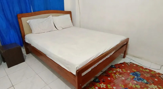 Номер Economy Hotel O Wisma Parakita Syariah Near RS Faisal Patalasang