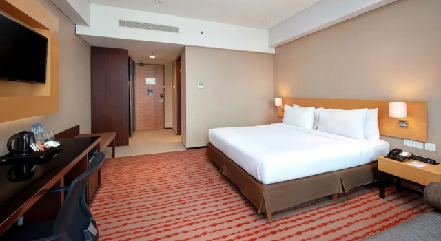 Номер Deluxe c 1 комнатой JS Luwansa Hotel & Convention Center