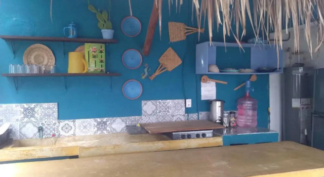 Кровать в общем номере Hostal Jardin