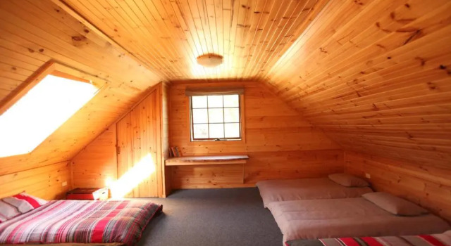 Bett im Wohnheim Tranquil Point