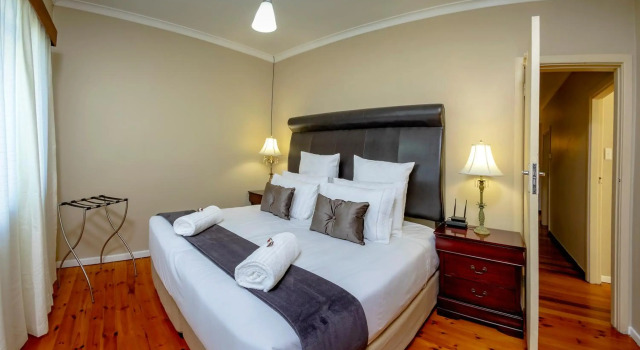 Munro Suites, Забронировать Отель Отели и гостиницы Порт-Элизабет, рядом с Стадион «Нельсон Мандела Бэй», Отель