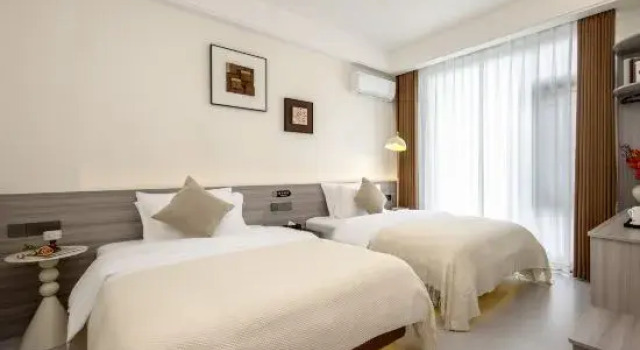 Кровать в общем номере Pingtan Lanximei Homestay