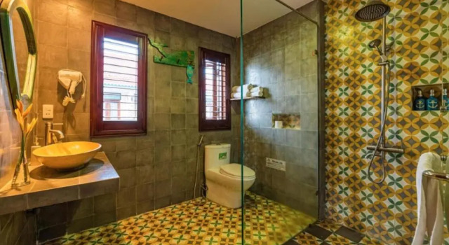 Кровать в общем номере Fuse Beachside Hoi An