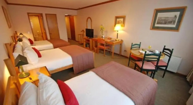 Трёхместный номер Standard abba Presidente Suites Puerto Montt