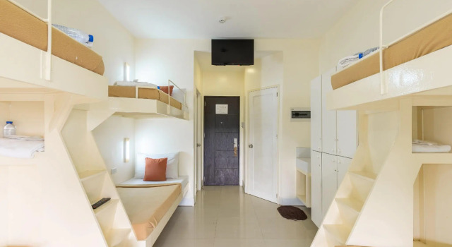 Кровать в общем номере Selah Garden Hotel Manila