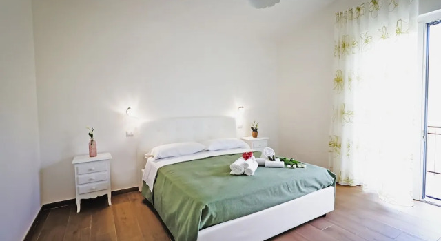 Четырёхместный номер Comfort Acquasanta Relais