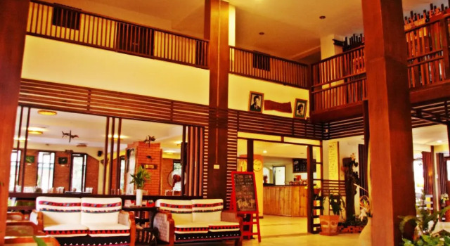 Кровать в общем номере Phumanee Lahu Home Hotel