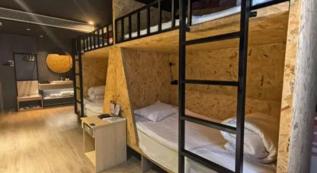 Кровать в общем номере Huaizuo Mingdu Nations Hotel Yangzhou