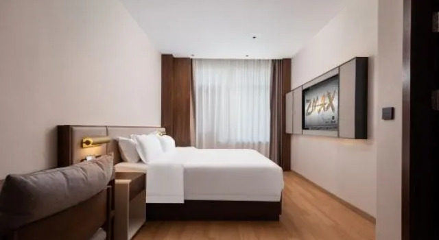 Люкс Deluxe ZMAX Manxi Hotel (Tianjin Wuqing High-speed Railway Station Florence Town)