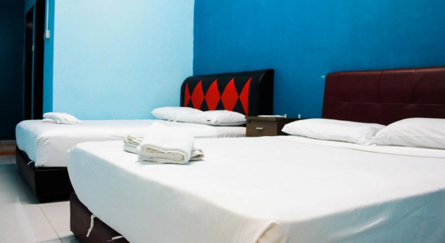 Четырёхместный номер Standard Q Hotel