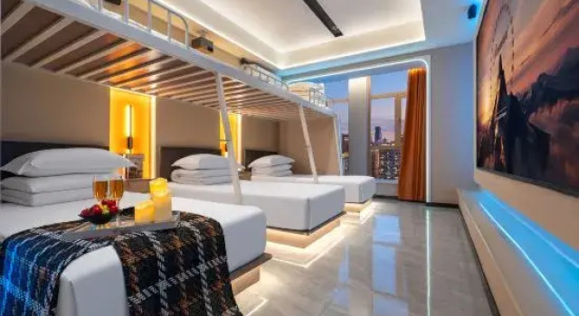 Кровать в общем номере Ye and Chen Esports Movie Hotel