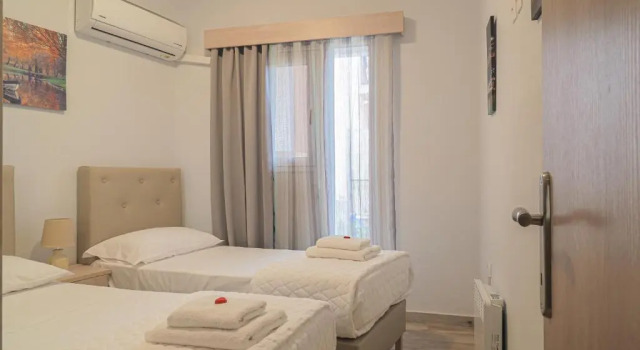 Charmy 2BD Apartment near Mon Repos Beach, Забронировать Апартаменты/квартира Апартаменты периферии Ионических островов, Апартаменты/квартира