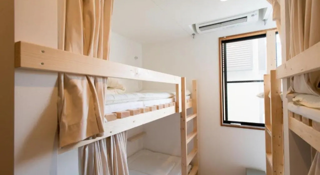 Кровать в общем номере plumhostel