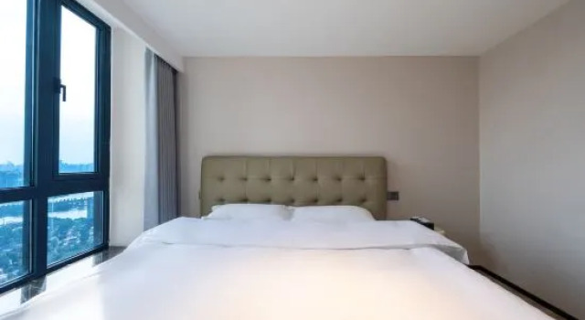 Трёхместный люкс Executive Дуплекс с видом на озеро Fanmo Hotel (Hunan Radio and Television Exhibition Center)