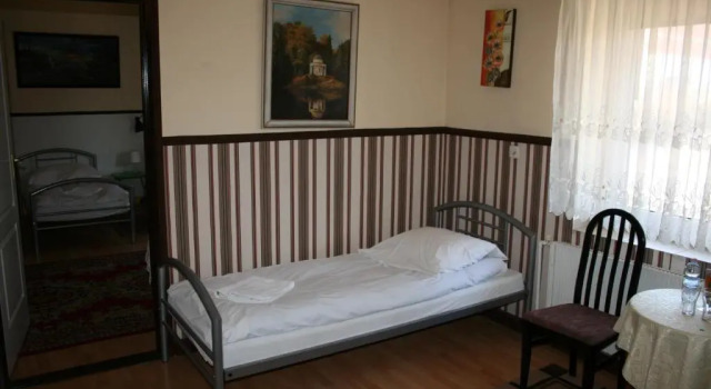 Кровать в общем номере Hotel Komfort Inn - Dwór Hubertus