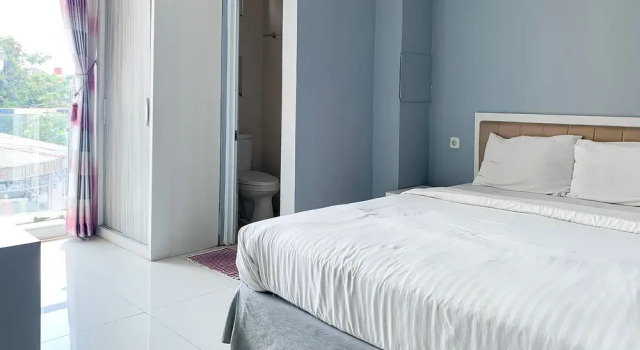 Deluxe Zimmer Karins Guesthouse Syariah RedPartner