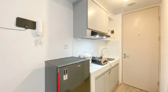 Студия Deluxe Well Furnished Studio Room At High Floor Tokyo Riverside Pik 2 Apartment
