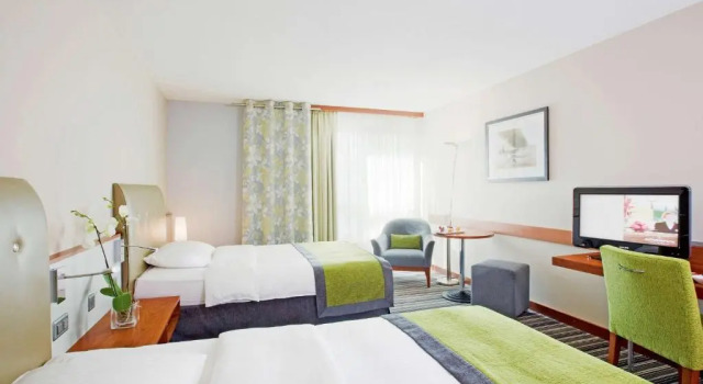 Четырёхместный семейный номер Standard Mövenpick Hotel Zurich Airport
