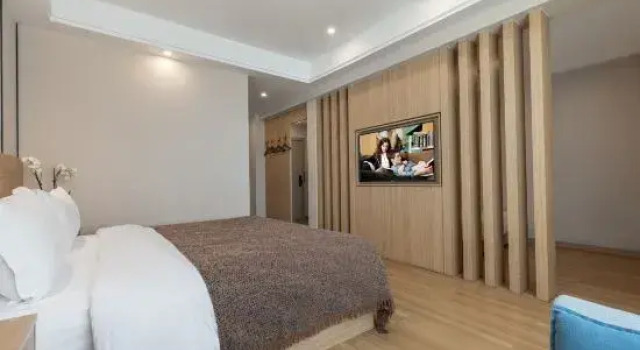Кровать в общем номере Yunshangli Garden Hotel