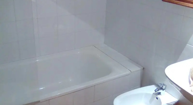 Кровать в общем номере с 3 комнатами Apartamentos Todosierranevada - Zona Baja