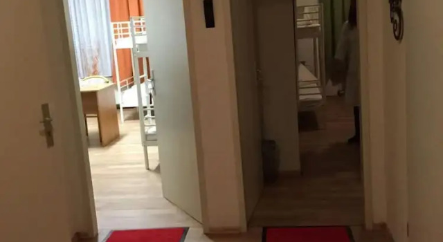 Кровать в общем номере Hotel Drei Kronen