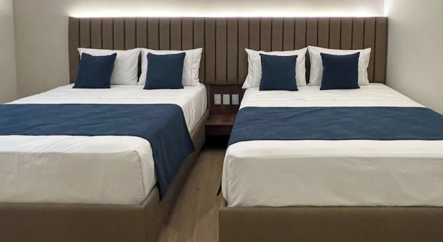 Exécutive quadruple chambre Hotel Continental By Hours