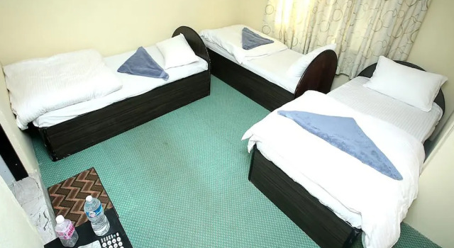 Трёхместный номер Standard Mitra Garden Inn