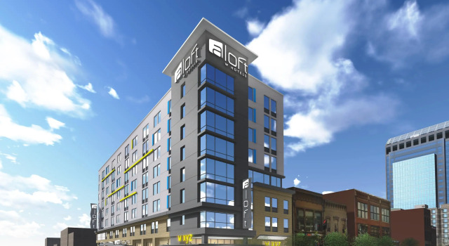 Кровать в общем номере Aloft by Marriott Louisville Downtown