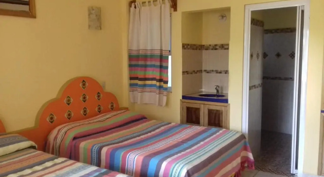 Четырёхместный номер Comfort с балконом и с красивым видом из окна El Tucan