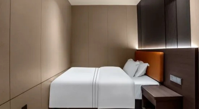 Люкс Executive с 2 комнатами Mengdan International Hotel (Jiangmen Hetang Central Square Jinyi City Branch)