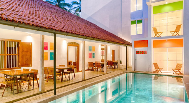 Кровать в общем номере Hotel J, Unawatuna