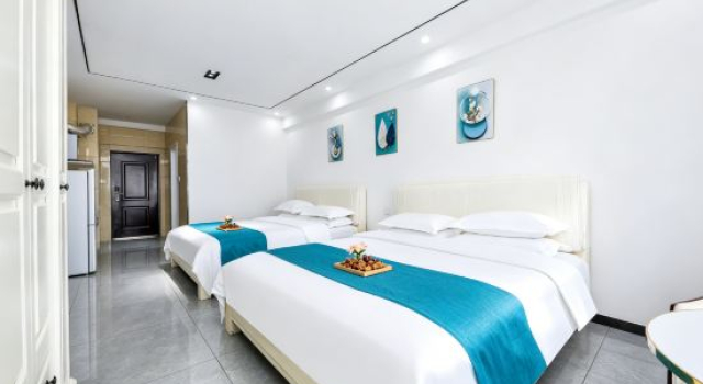 Кровать в общем номере Jinmei Hotel
