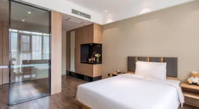 Люкс Chengdu Manju  Hotel ( West Railway Station Qingyang Wanda Branch)