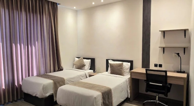 Семейные апартаменты с 2 комнатами с балконом и с видом на город Alshakreen suites