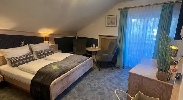 Двухместный номер Comfort с балконом и с видом на сад Hotel Quellenhof