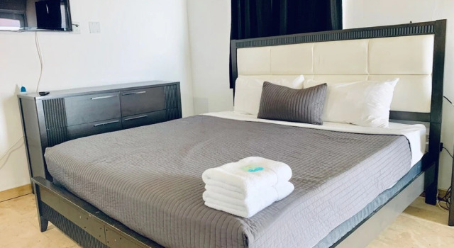 Четырёхместный люкс Manati World Point Inn