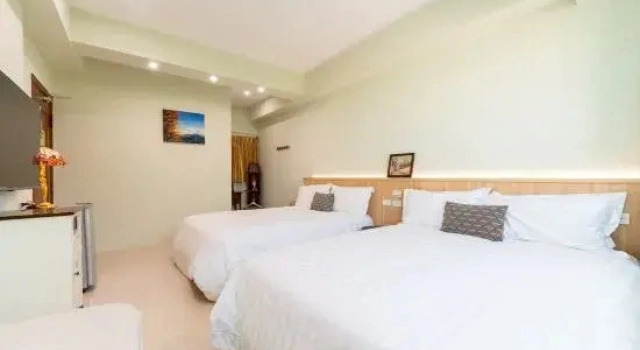 Четырёхместный номер Standard с красивым видом из окна Tainan Anping Bailuwan House